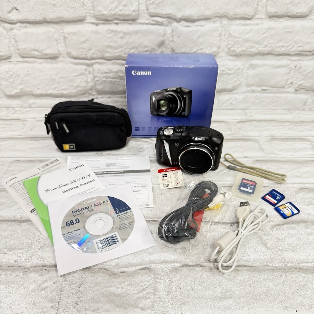 Canon SX130 IS Powershot Digital Camera 12x Optical Zoom 12.1 MP Black Excellent